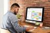 Man sat at computer desk