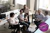 informal chat taking place between colleagues in a office