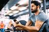 Man lifting weights in a gym
