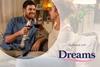 Couple enjoying a glass of wine on sofa
