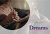 Dreams, lady relaxing in bed with a coffee and book