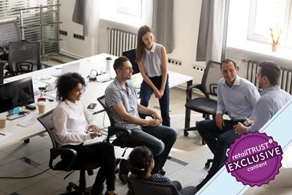 informal chat taking place between colleagues in a office