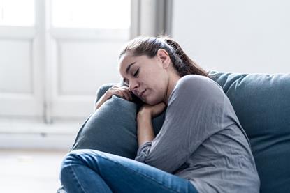 Woman sleeping on a sofa