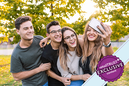 Group of teenagers taking a selfie and laughing