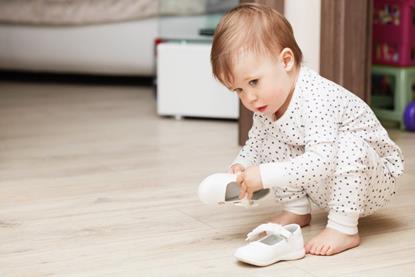 Cute baby crouching